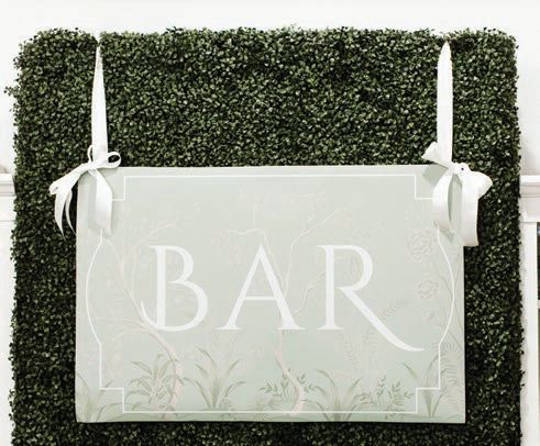 A chic bar sign. Photographed by True Grace Photography