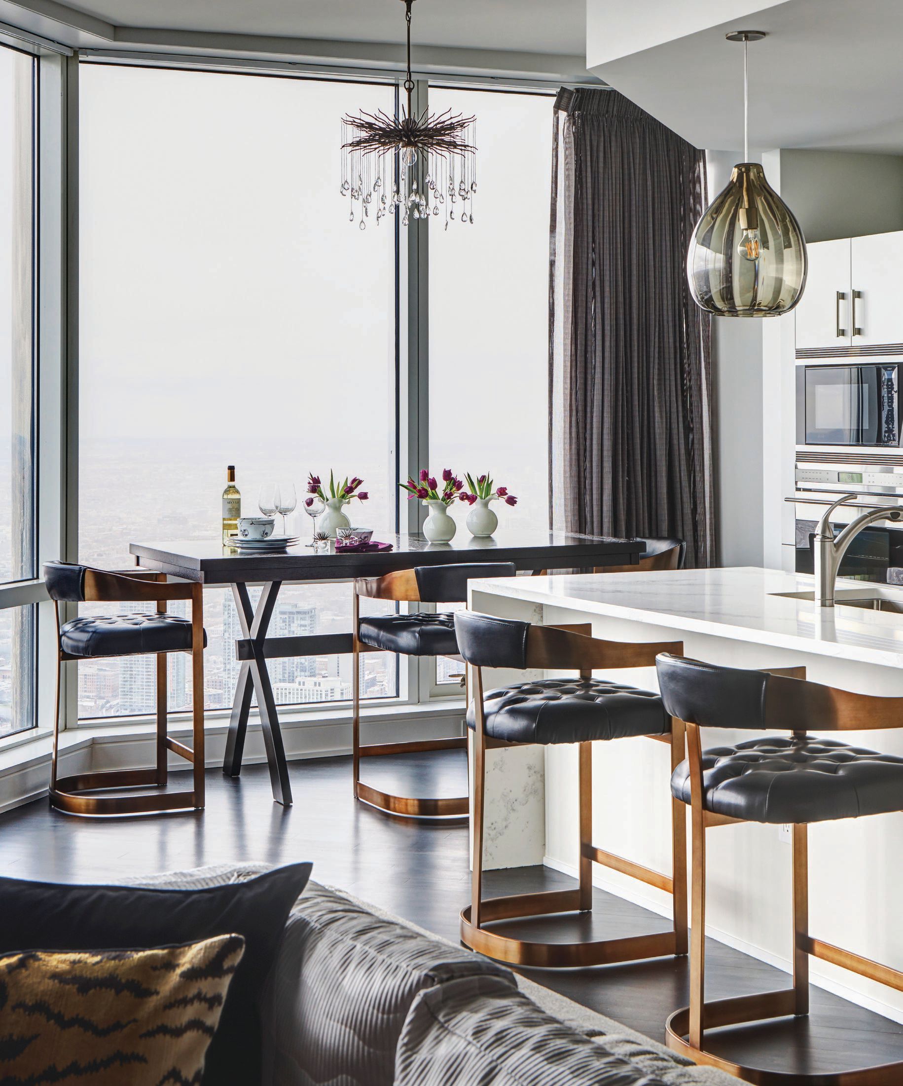 Gold-accented Sunpan counter stools add an elegant edge to the kitchen. PHOTOGRAPHED BY MICHAEL ALAN KASKEL
