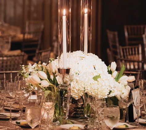 “We wanted to keep the floral arrangements elegant and enhance the environment with well-thought-out lighting,” they say.