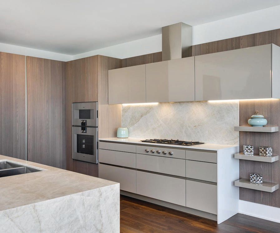 Well-appointed kitchens come with natural quartz and stone countertops, Kohler stainless steel sinks and sleek Snaidero cabinetry from 210 Design House. PHOTO COURTESY OF THE RESIDENCES AT THE ST. REGIS CHICAGO