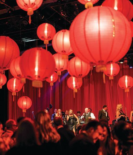 Red paper lanterns above the dance floor paid
homage to Eliot’s childhood in China;