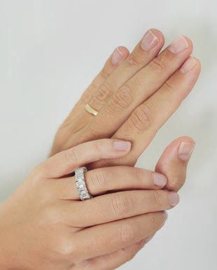Both rings are De Beers Forevermark and the groom’s ring features a hidden diamond and a special inscription inside Photographed by Christian Oth, Christian Oth Studio