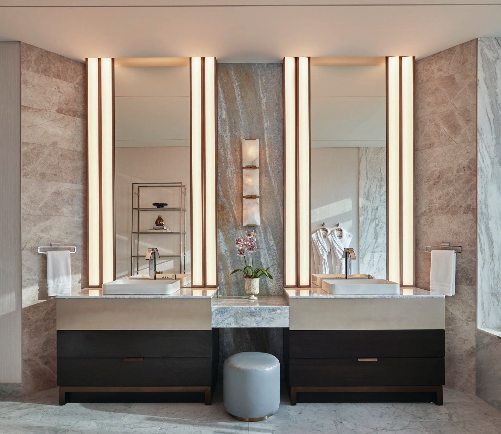 A custom vanity greets guests in the presidential suite’s luxe bathroom  Photographed by Mike Schwartz