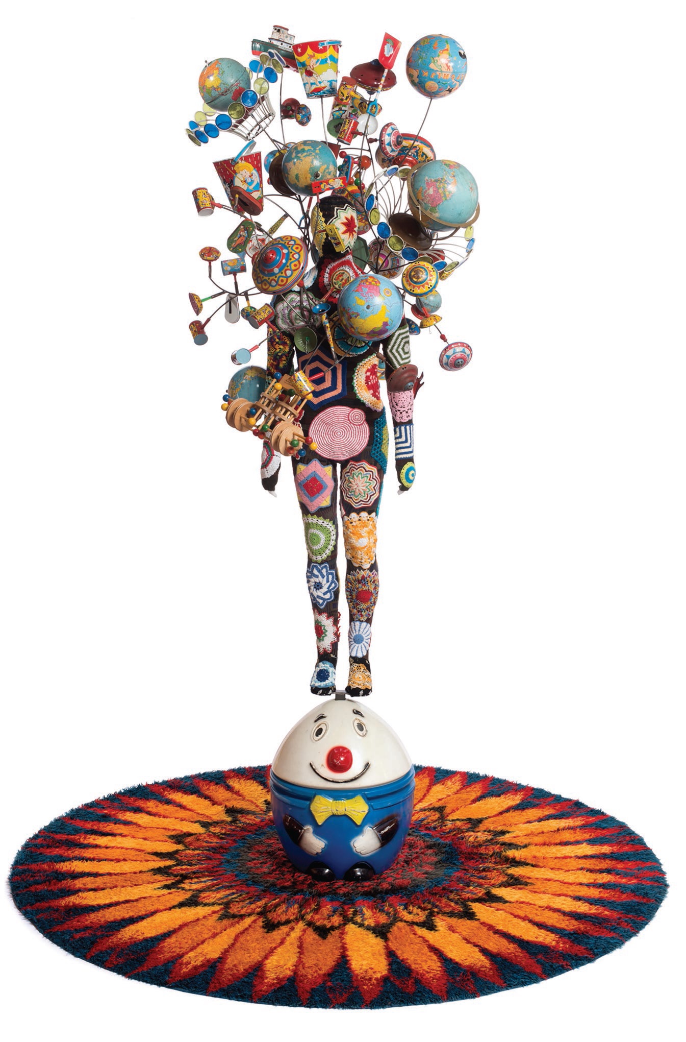 “Soundsuit” (2012, mixed media including embroidery, fabric, vintage toys, rug and mannequin), 127 inches by 98 inches by 93 inches; rug 98 inches by 92 inches