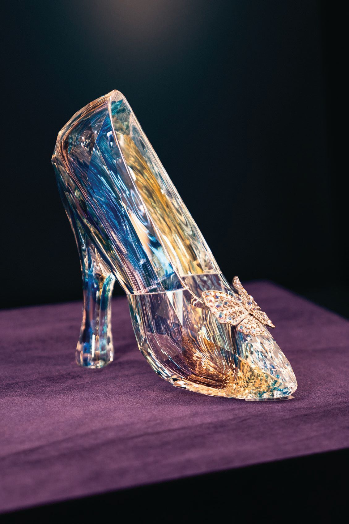 Fom the liveaction Cinderella (2015), this glass slipper is on display in the “Where Do the Stories Come From?” gallery at Disney100: The Exhibition. PHOTO © DISNEY