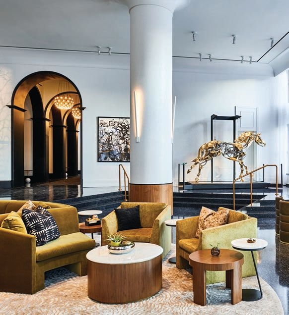 Adrian Landon’s golden horse commands the spotlight in the lobby. PHOTO COURTESY OF DAXTON HOTEL