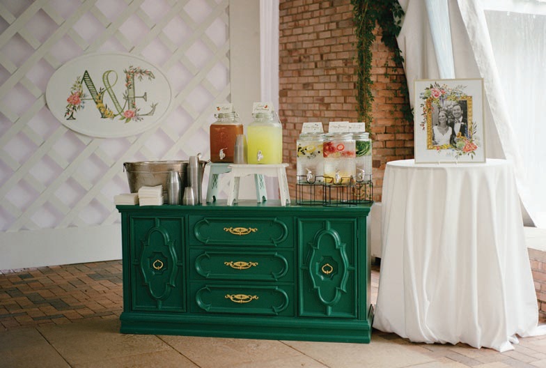 An emerald-green credenza held refreshments Photographed by Liz Banfield