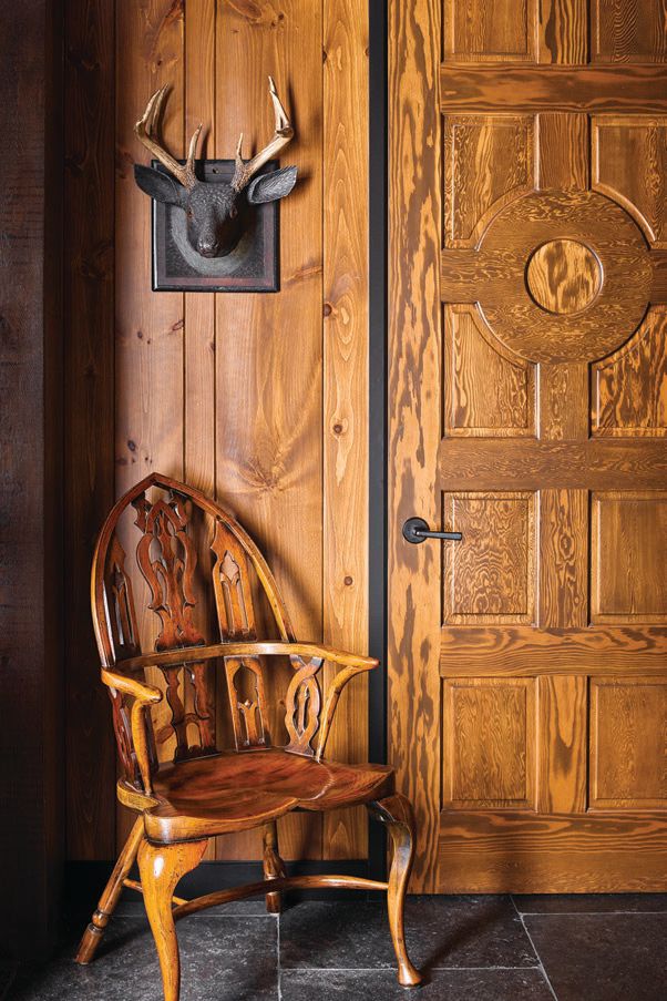 A carved deer head (c. 1875) by Harry Leach in the stair hall PHOTOGRAPHED BY ERIC PIASECKI