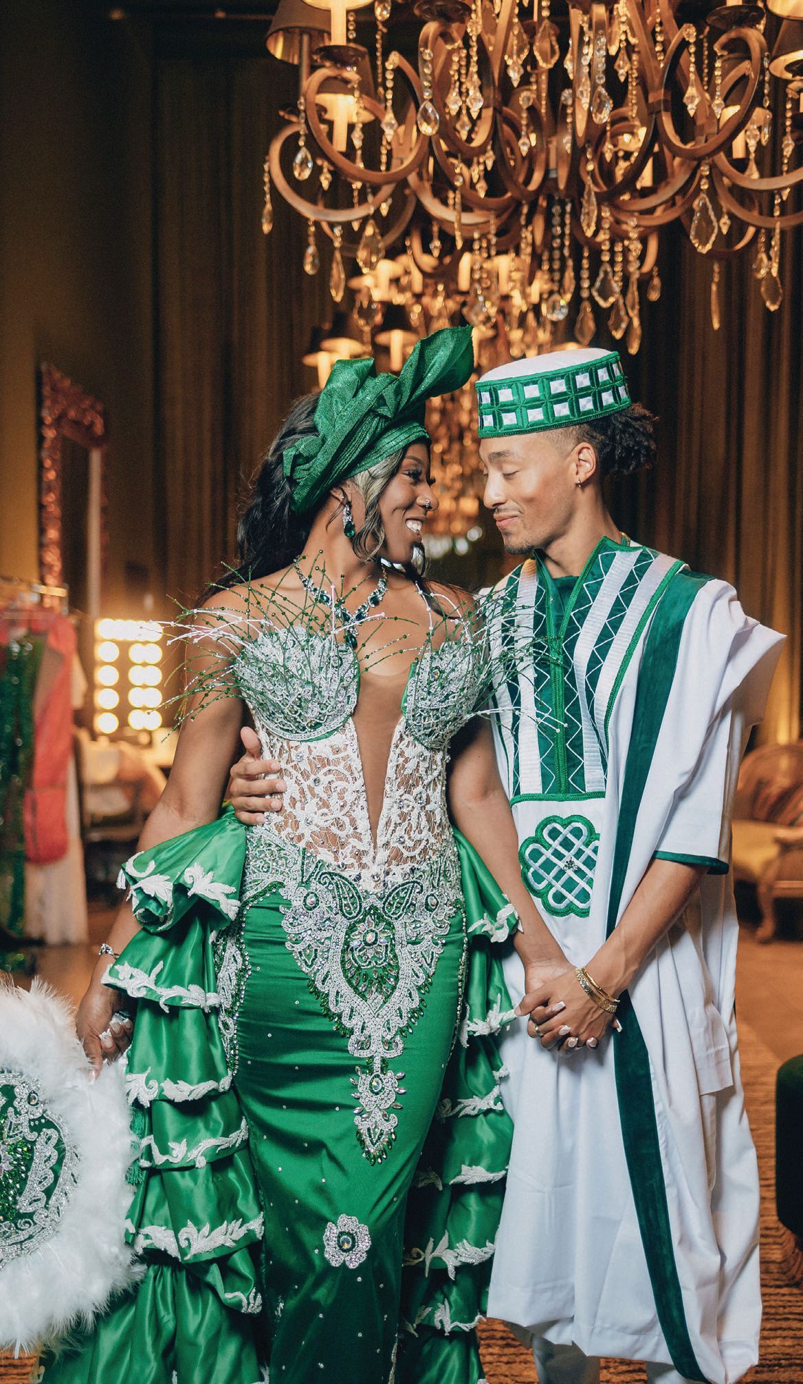 The couple donned traditional Nigerian wedding attire for part of the celebration. Photographed by REEM Photography