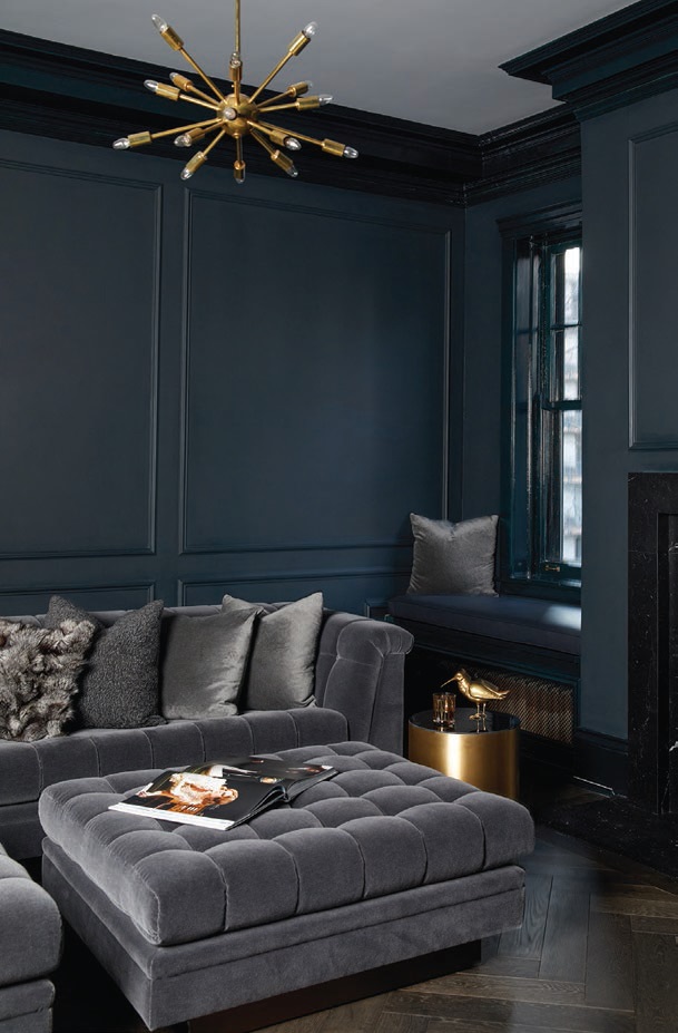 Mixed tones and metal finishes complete this moody sitting area. PHOTOGRAPHED BY HEATHER TALBERT