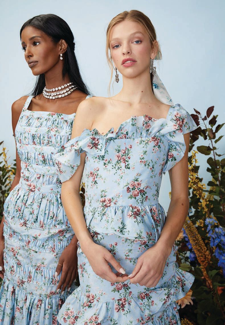 Devon shirred dress in light blue floral taffeta and Daria cocktail dress in light blue floral taffeta. PHOTO BY TAYLOR JEWELL/COURTESY OF BRAND