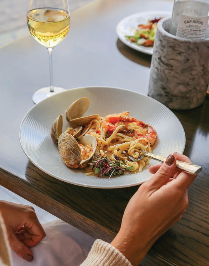 At the hotel’s ground-floor eatery, Subito, dishes like pasta topped with fresh seafood put the restaurant on the city’s culinary map. PHOTO COURTESY OF THE LYTLE PARK HOTEL