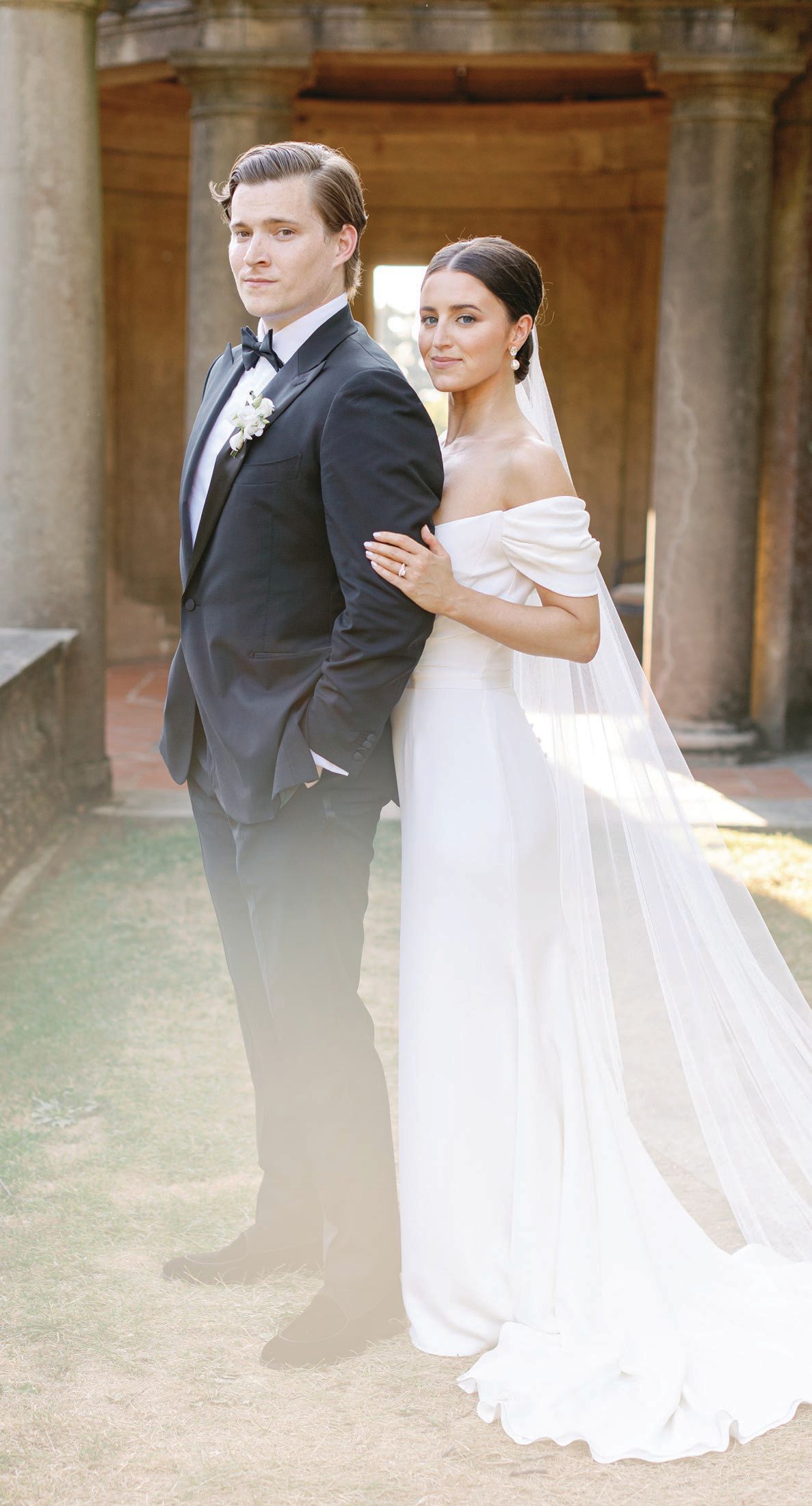 The newlyweds posed for a sophisticated portrait. Photographed by Alisha Norden Photography