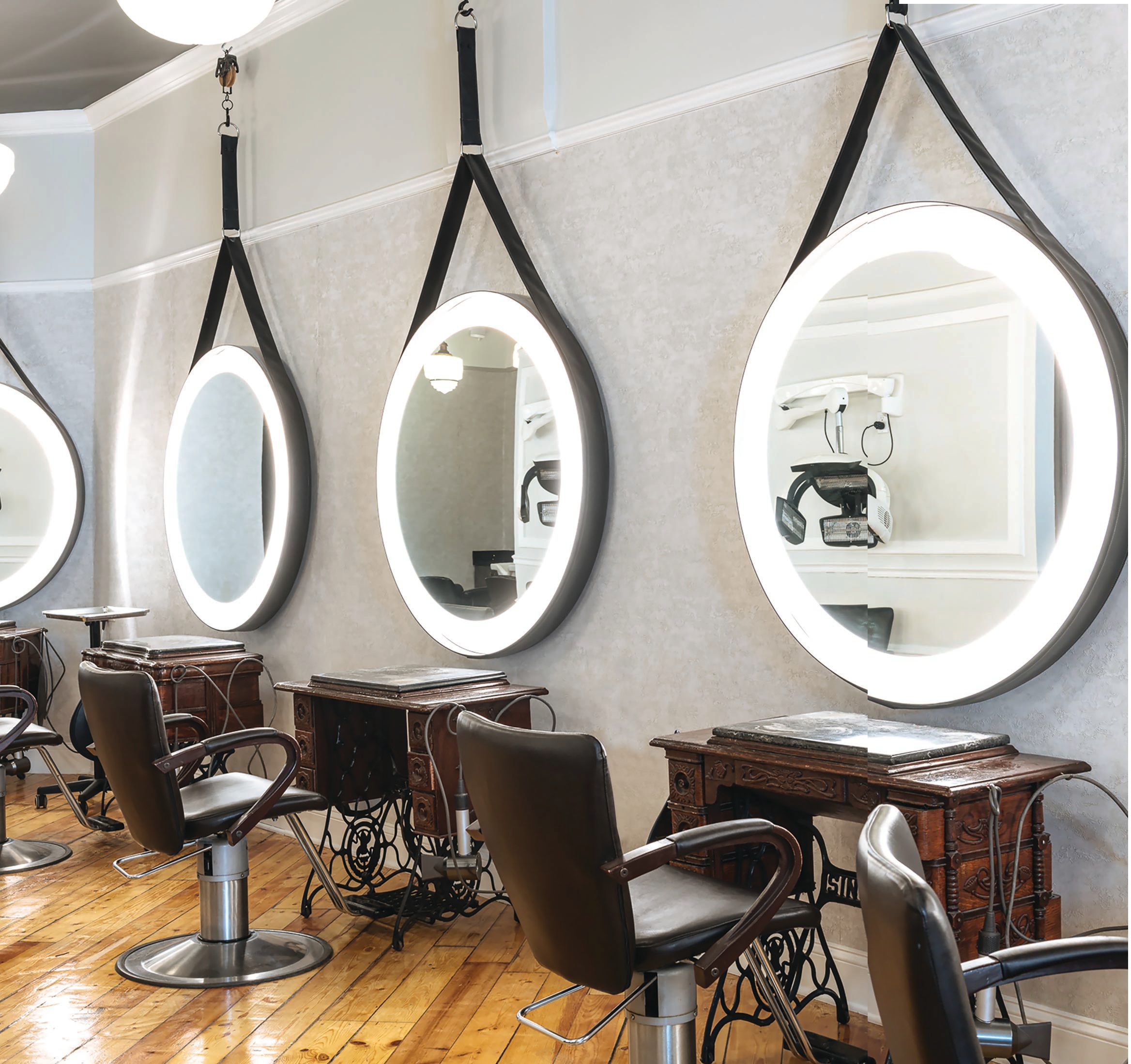 The new location features a.salon’s signature circular mirrors. PHOTO BY SEAN HOPKINS