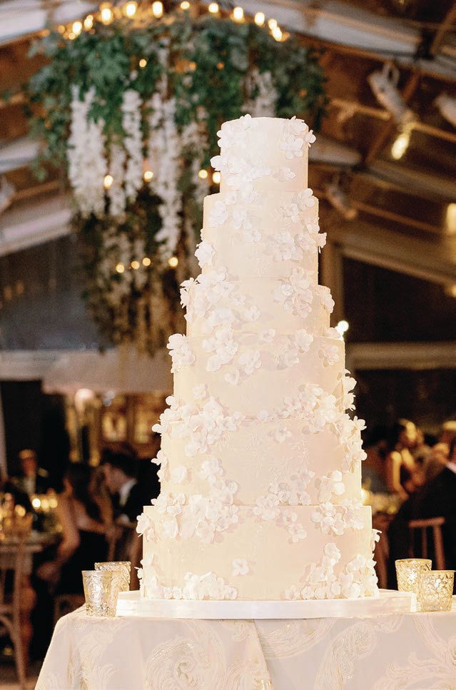 The cake was inspired by the bride’s gown Photographed by Olivia Leigh Photographie