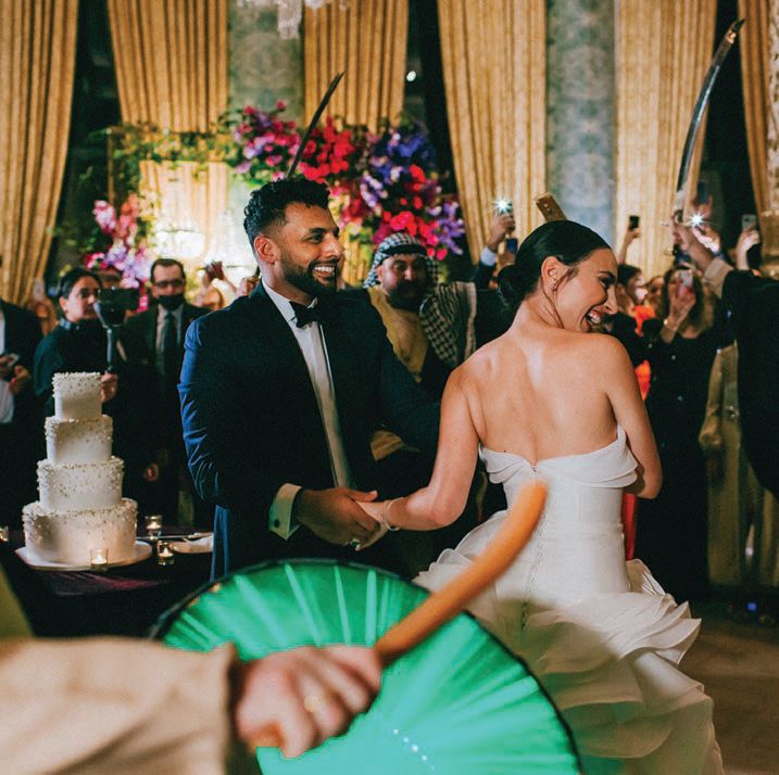 Middle Eastern traditions like the katb el-kitab ceremony and a zaffa group at the reception were incorporated into their wedding. Photographed by Caroline Ghetes