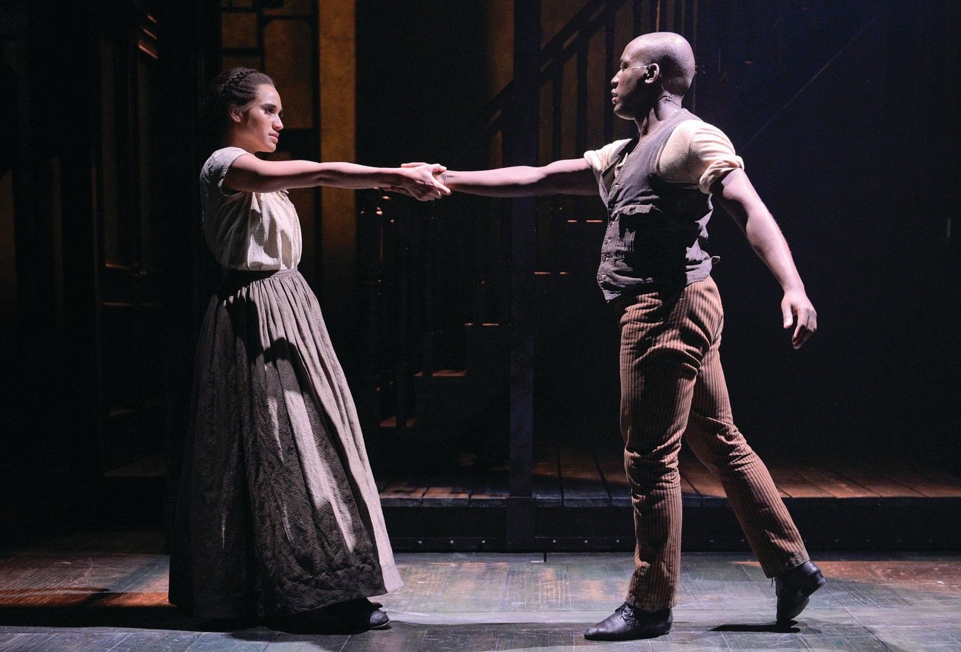 Cast members Gabrielle McClinton and Sidney DuPont share a moment on stage. PHOTO BY KEVIN BERNE