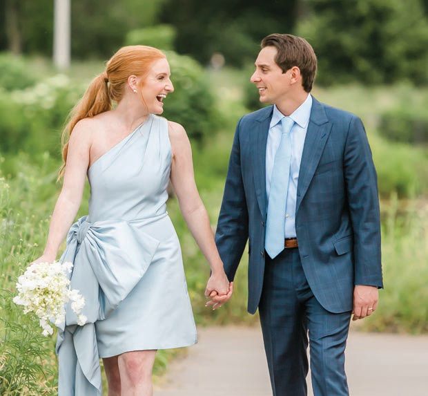The couple went less traditional with their attire for the 2022 reception, with Arin wearing her “something blue.” PHOTO BY NATALIE PROBST PHOTOGRAPHY