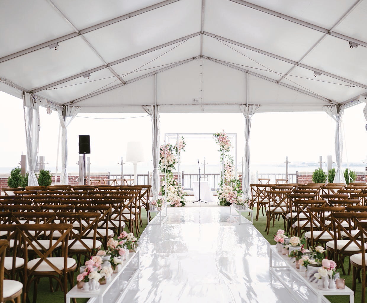 Both dance floor and aisle were covered with white latex “to make them
really glisten,” says the bride Photographed by Connie Marina Photography