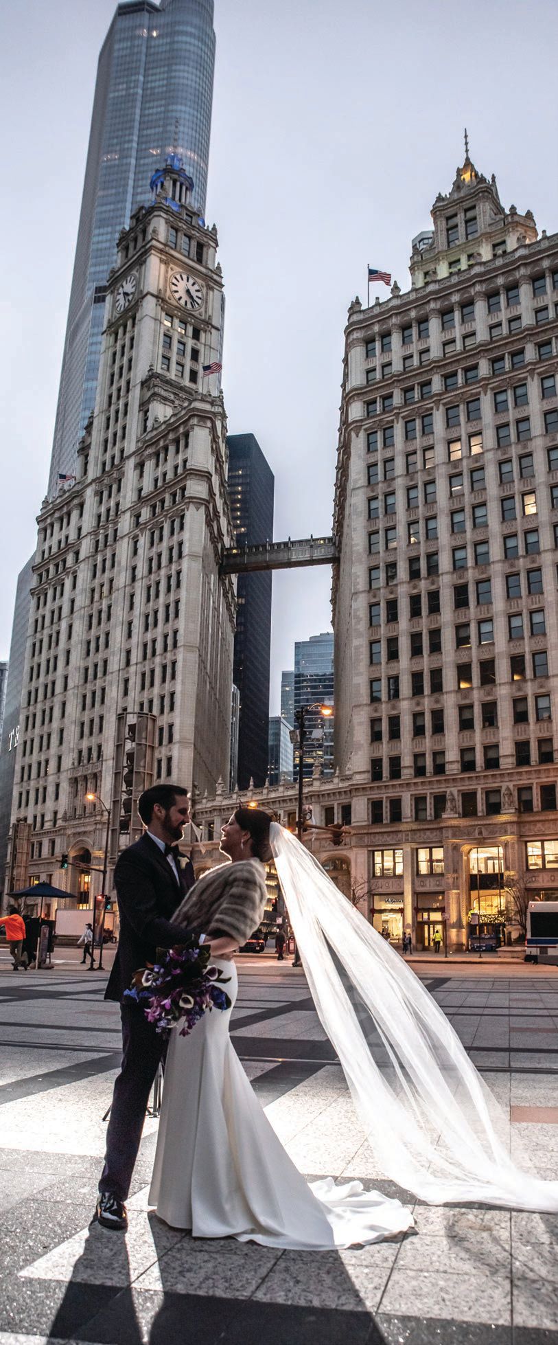 An iconic Chicago wedding portrait at The Wrigley Building www.lacourimages.com Photo Credit: LaCour Images Planner: Frank Event Design
