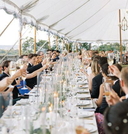 Guests raised their glasses in a toast Photographed by Alisha Norden Photography