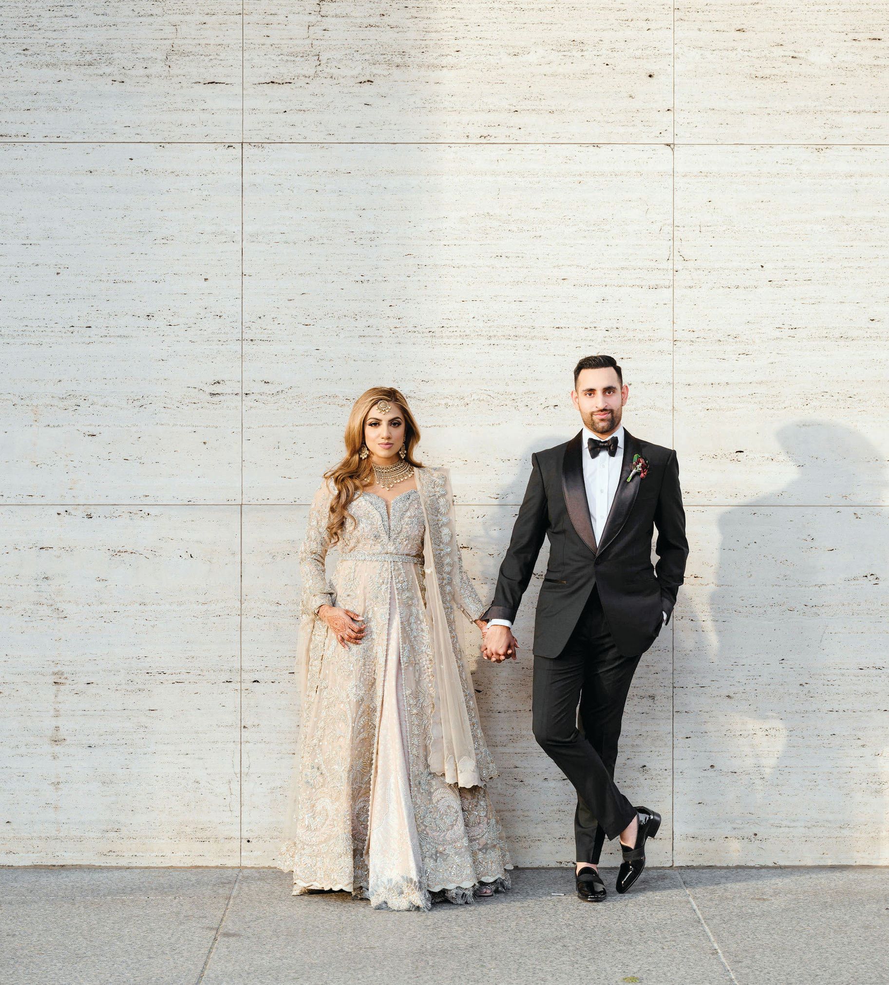 The couple posed for a portrait outside The Langham, Chicago, where the wedding party got ready. Photographed by IVASH Photography