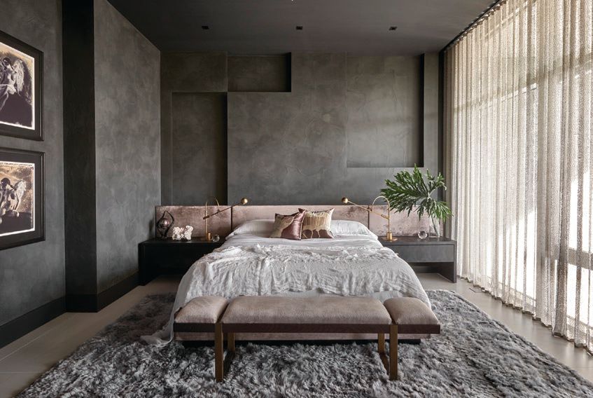 Studio BK covered the walls of the primary bedroom in a custom textured plaster finish, giving them a gritty texture and a slight sheen PHOTOGRAPHED BY TONY SOLURI