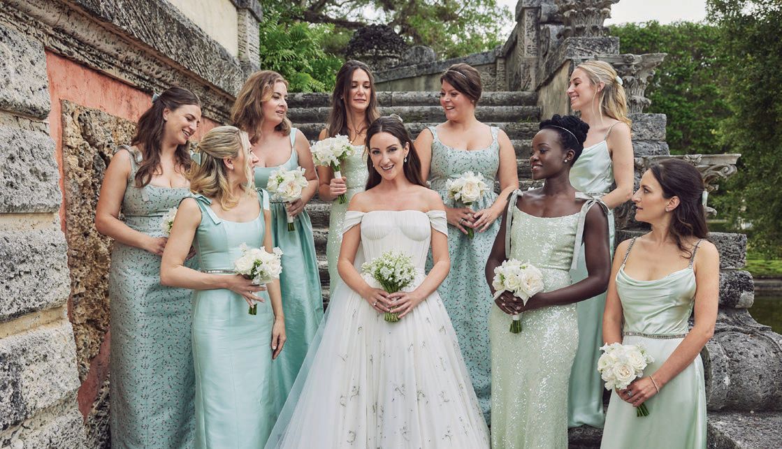 Bridesmaids (including actress Lupita Nyong’o) wore custom gowns by Markarian with hair accessories by Jennifer Behr Photographed by Christian Oth, Christian Oth Studio