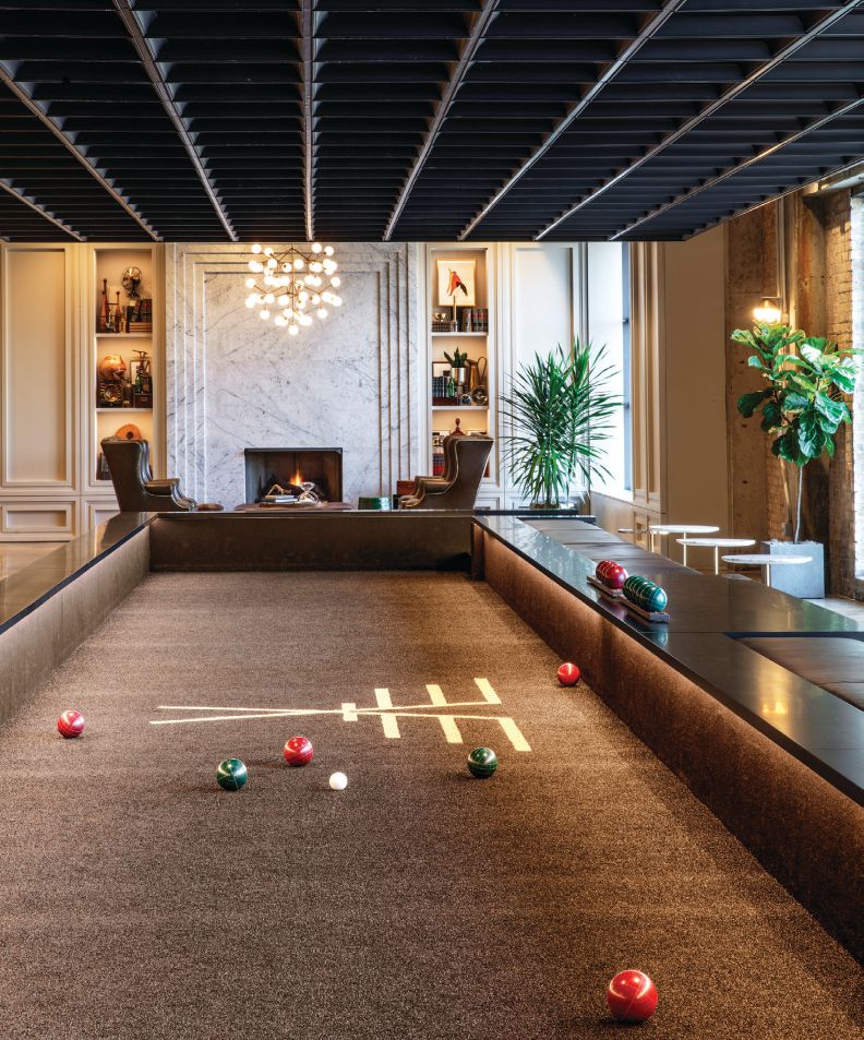 Pool tables add playfulness to the space. PHOTO BY ERIC LAIGNEL