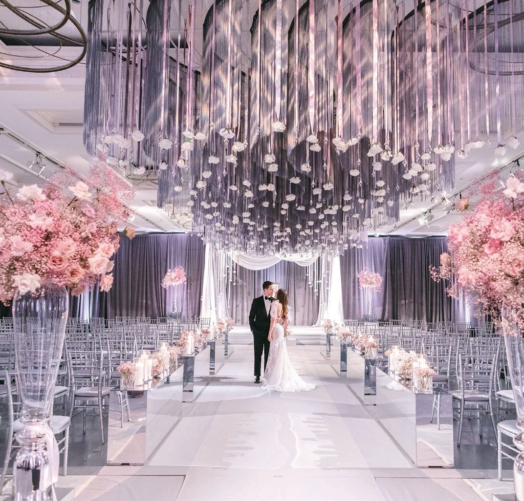 The ballroom at Four Seasons Hotel Chicago was completely transformed for a look that was “contemporary with a touch of whimsy,” says the bride Photographed by Tim Tab Studios
