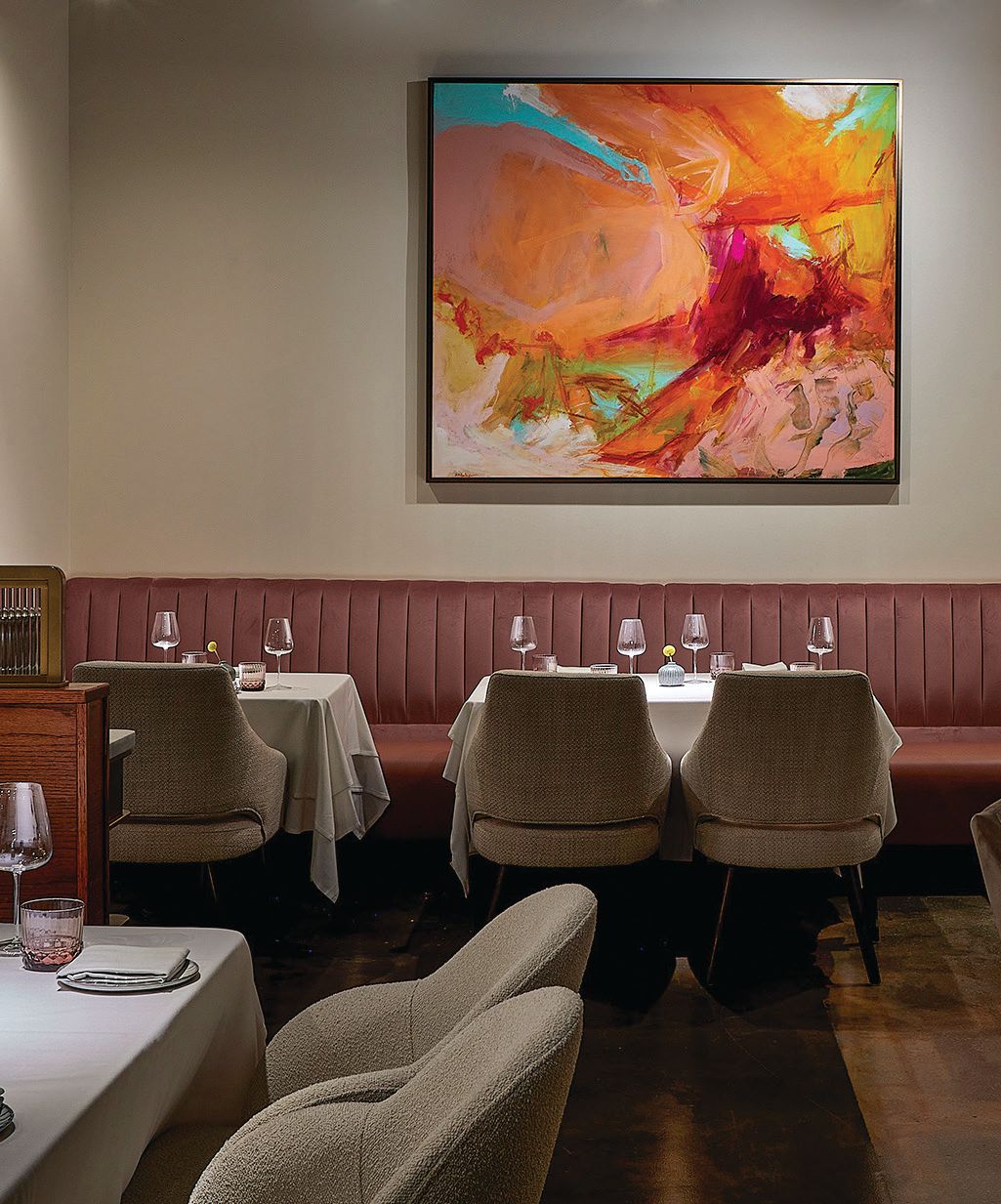 Designed by chef Sujan Sarkar himself, Indienne’s interiors feature soothing tones and colorful artwork inspired by the Indian festival of Holi by Chicago-based Ken Andjulis. PHOTO BY NEIL BURGER