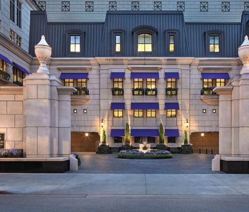 Waldorf Astoria Chicago’s grand courtyard entrance, designed by renowned architect Lucien Lagrange
