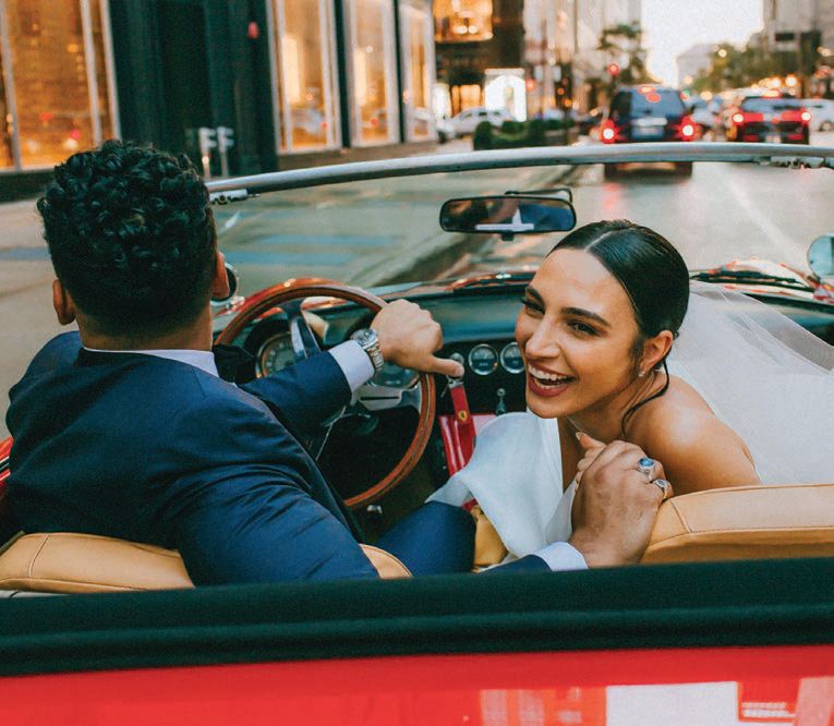 The newlyweds cruised through the streets of Chicago in a red Ferrari 250 GT Spyder Photographed by Caroline Ghetes
