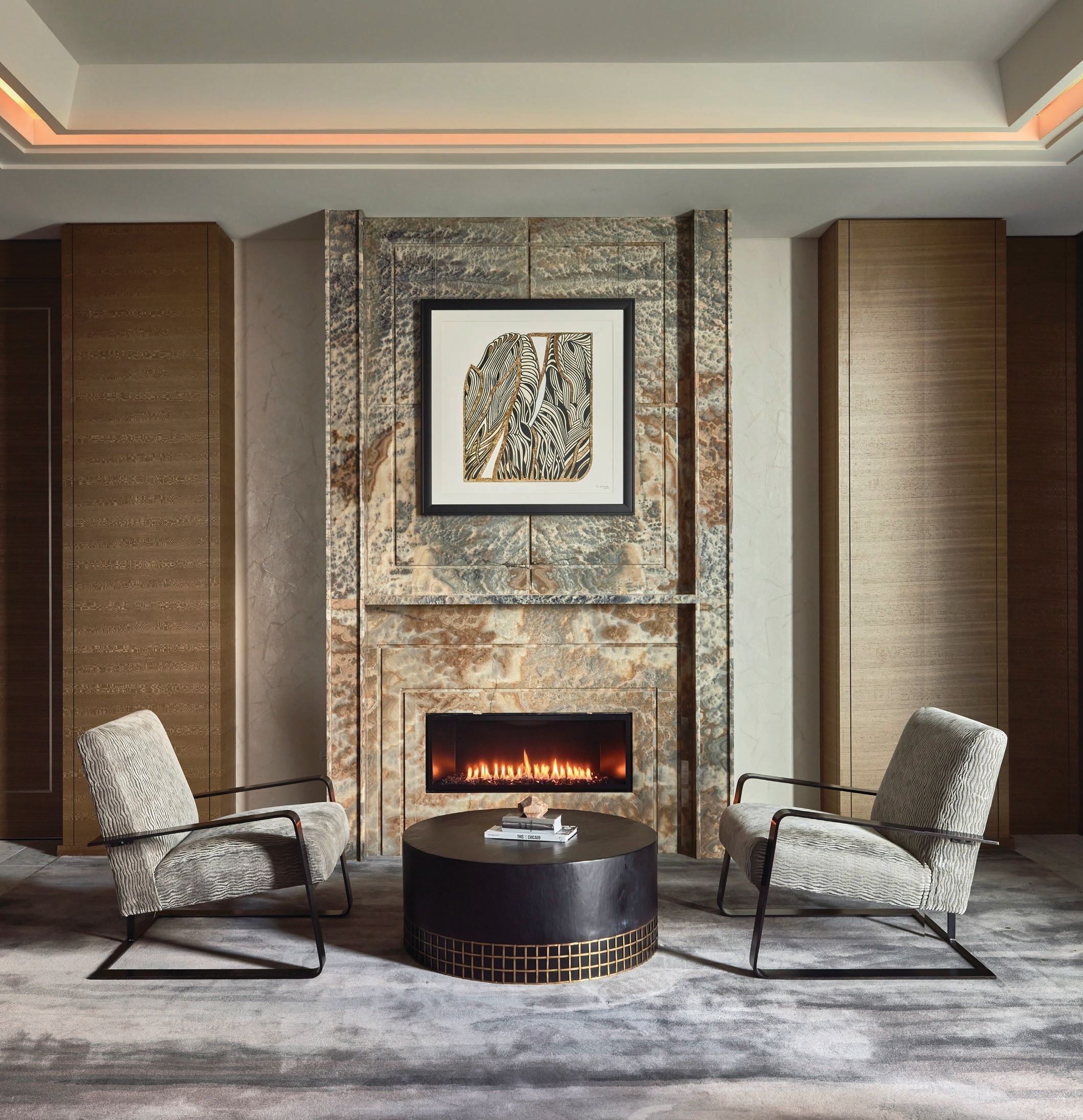 The presidential suite pairs neutral tones with organic shapes plus metallic and stone details to create a sense of contemporary urban sophistication. Photographed by Mike Schwartz