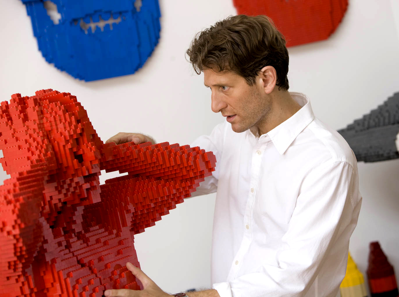 Nathan Saway with a Lego sculpture